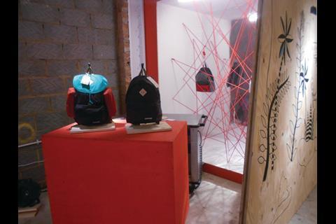 The store also has a couple of red string art installations.